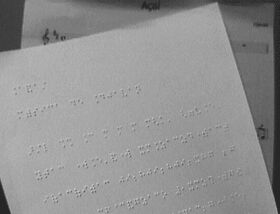 Pgina braille e sua contraparte em tinta